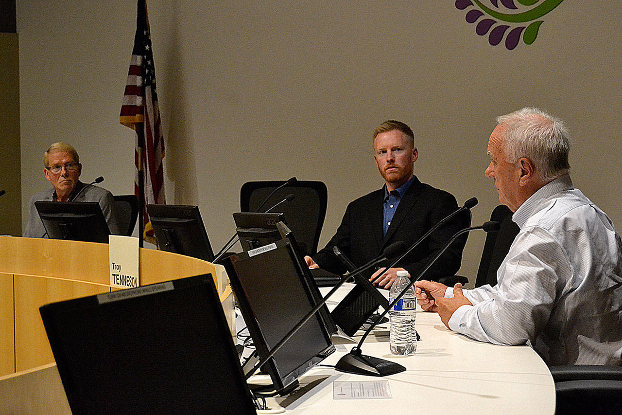 Sequim city council candidates, from left, William Armacost, Troy Tenneson and Tom Ferrell discuss various issues at a town hall on Oct. 9. The three candidates are unopposed for their respective seats. Sequim Gazette photo by Matthew Nash