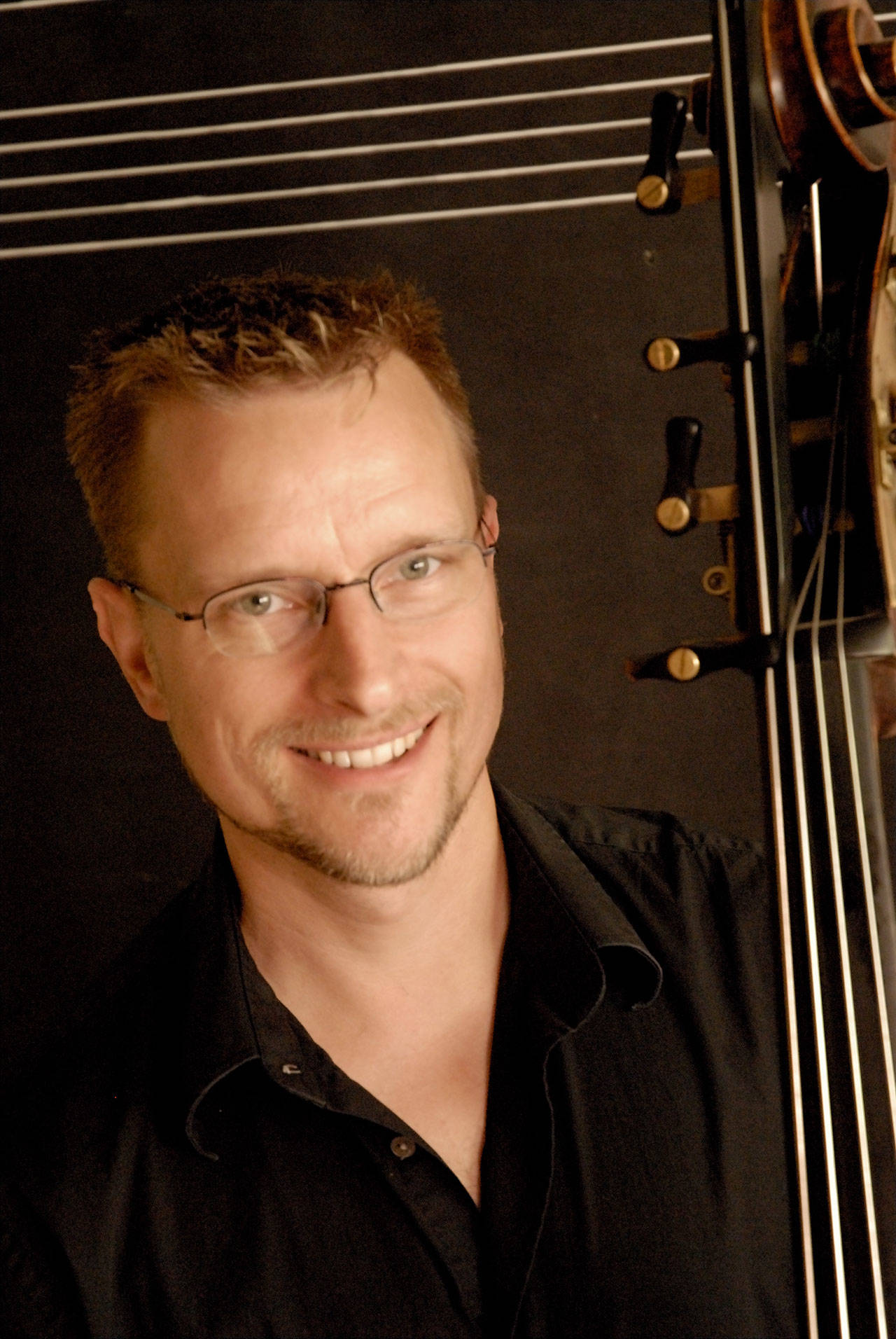 Double-bassist Steve Schermer is one of the guest soloists in the Port Angeles Symphony Orchestra and Chorus’ Holiday Favorites & Classics concert Saturday, Dec. 14. Submitted photo