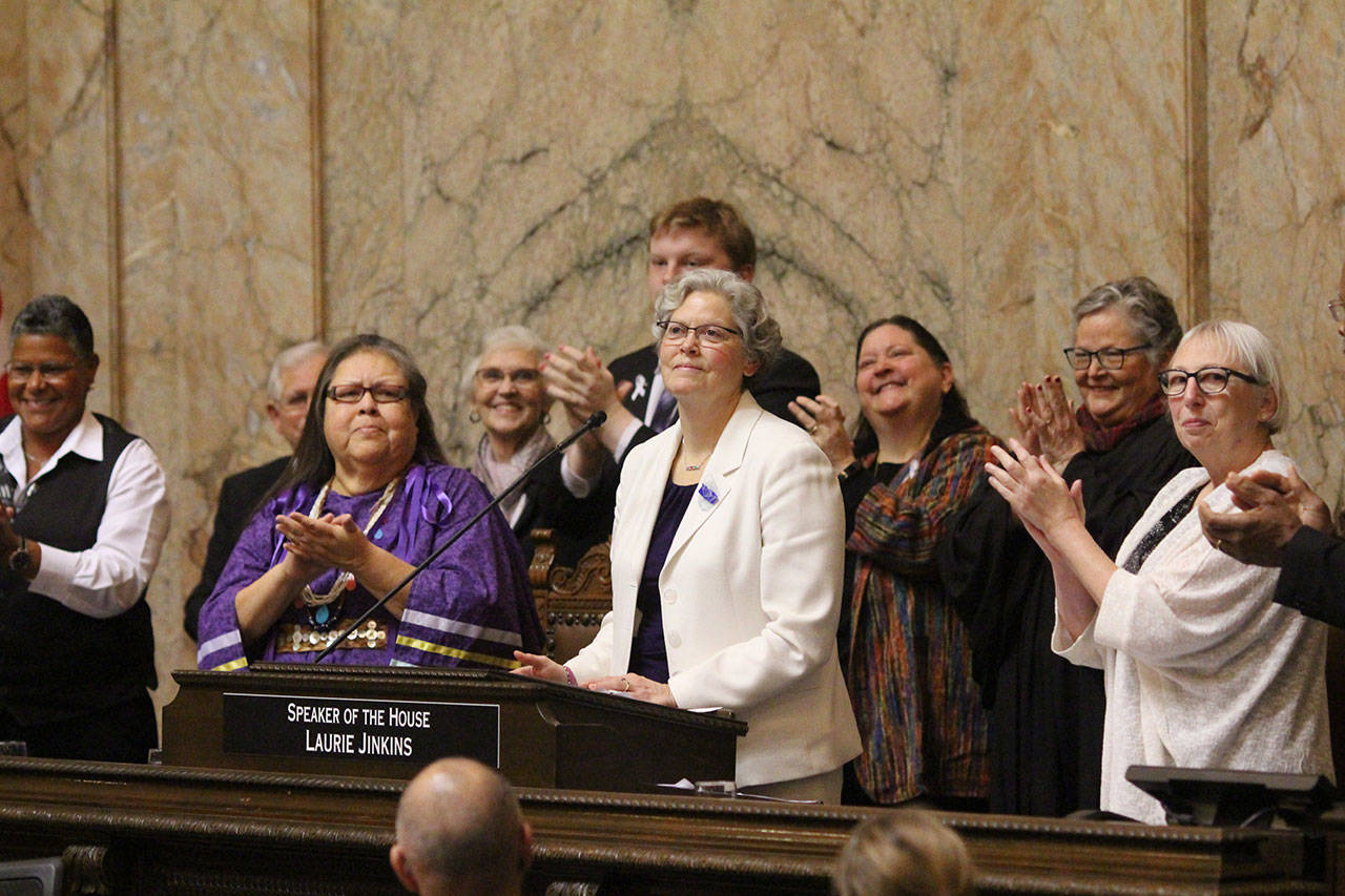 Rep. Laurie Jinkins, D-Tacoma, is applauded by her colleagues on Jan. 13 as she becomes the first woman in Washington state history to serve as Speaker of the House. Photo by Cameron Sheppard/WNPA News Service