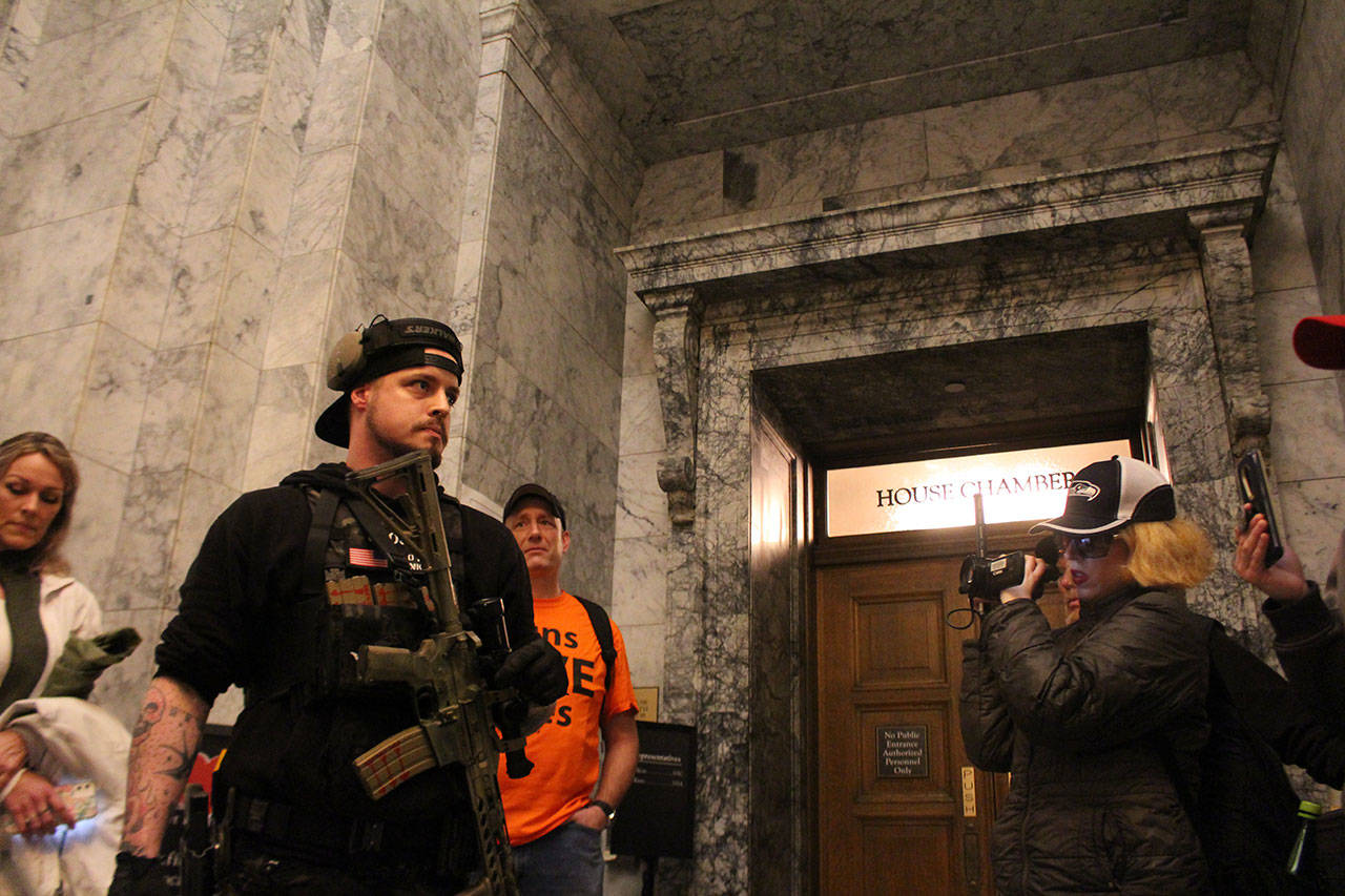 Gun rights advocate warns crowd of the potential need for forceful resistance in the future at gathering outside House of Representatives chamber. Photo by Cameron Sheppard/WNPA News Service