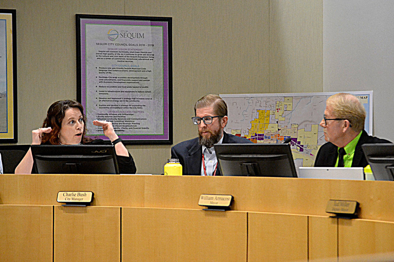 Sequim city attorney Kristina Nelson-Gross told City Manager Charlie Bush, Mayor William Armacost and other city councilors on March 9 that since there appeals for the classification of the proposed medication-assisted treatment (MAT) facility, they must hire a hearing examiner. However, many city councilors disagreed and opted not to hire one at this time. Sequim Gazette photo by Matthew Nash