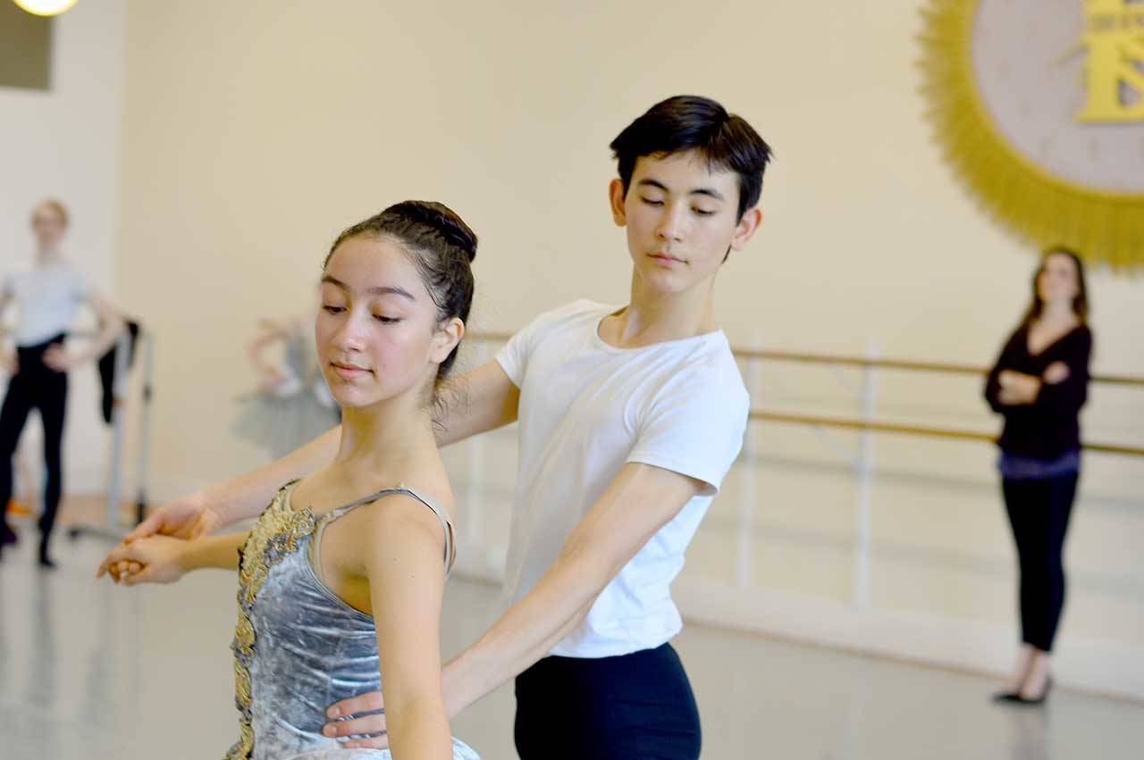 Isabella Knott of Port Angeles and Joh Merrill of Seattle rehearse at the Ballet Workshop earlier this year. They are part of the cast of the Ballet Workshop’s 50th anniversary gala, one of the events that may be rescheduled at the Port Angeles High School Performing Arts Center. Photo by Diane Urbani de la Paz