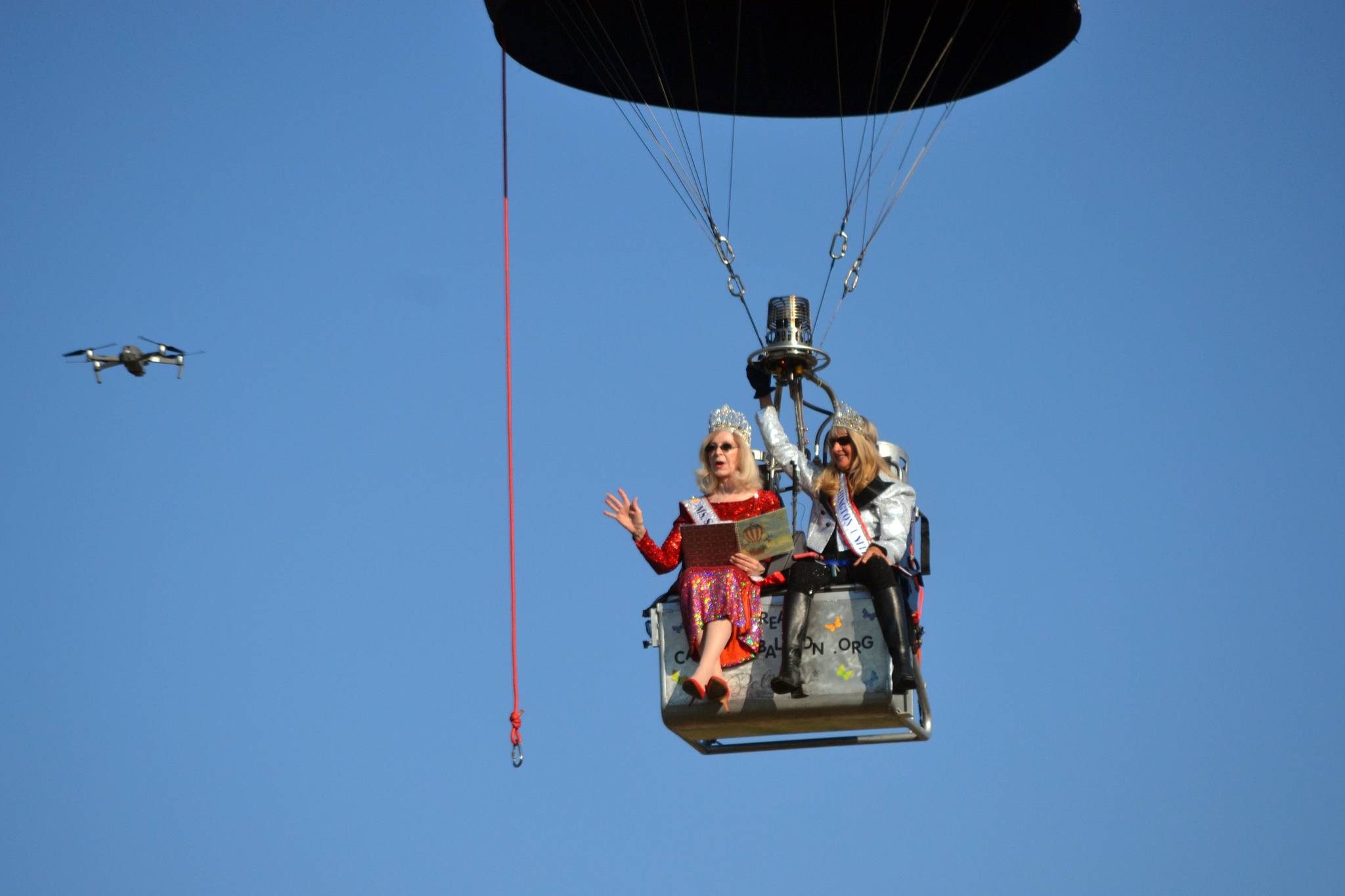 Cherie Kidd, Ms. Senior USA 2019-2020, left, and Captain-Crystal Stout, Ms. Senior Washington USA, film a promotional video from Stout’s Dream Catcher balloon for the Ms. Senior USA pageant in October. This was Kidd’s first time in a balloon on Sept. 9, and next month will be Stout’s first time competing in a pageant. Sequim Gazette photo by Matthew Nash