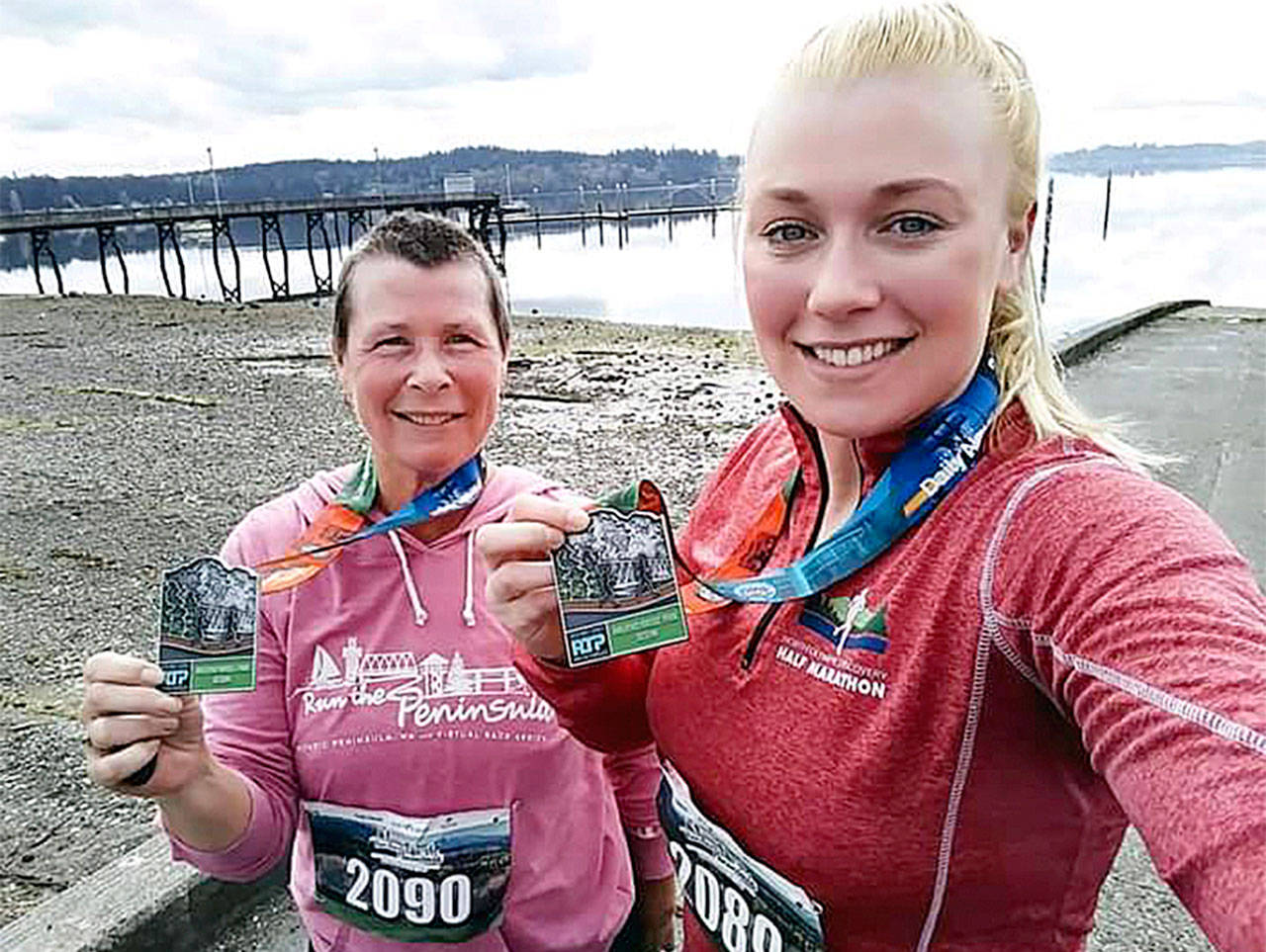 Mother and daughter Janet and Jessica Ouellet compete in the Run the Peninsula’s virtual 10K Railroad Run together in Seabeck. Photo courtesy of Run the Peninsula