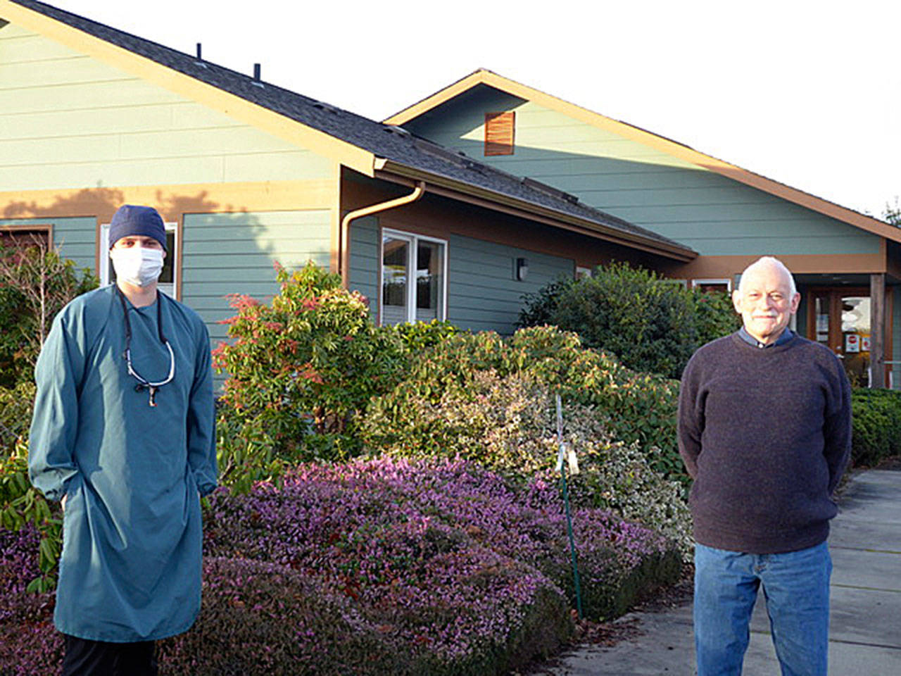 Dr. Nate Steim, left, takes over the practice that retiring dentist Randy Tierney started from scratch in Sequim more than two-and-a-half decades ago. Submitted photo