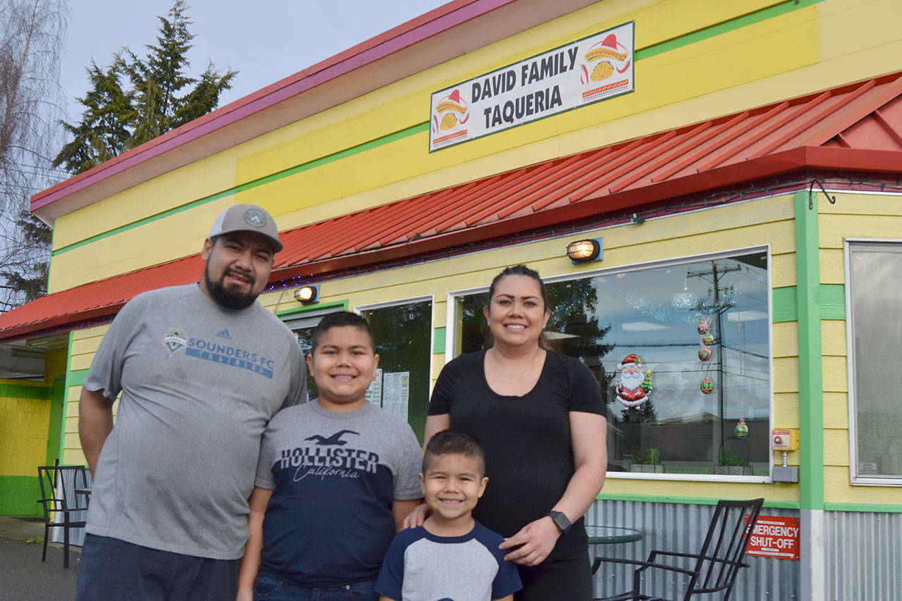 David Gallegos and Carmen Gil, pictured here with their boys Edison and Logan, opened David Family Taqueria on Oct. 19 last year and have seen a consistent stream of business in their new eatery. Some of the most popular items are the street tacos and Super Burrito. Sequim Gazette photo by Matthew Nash