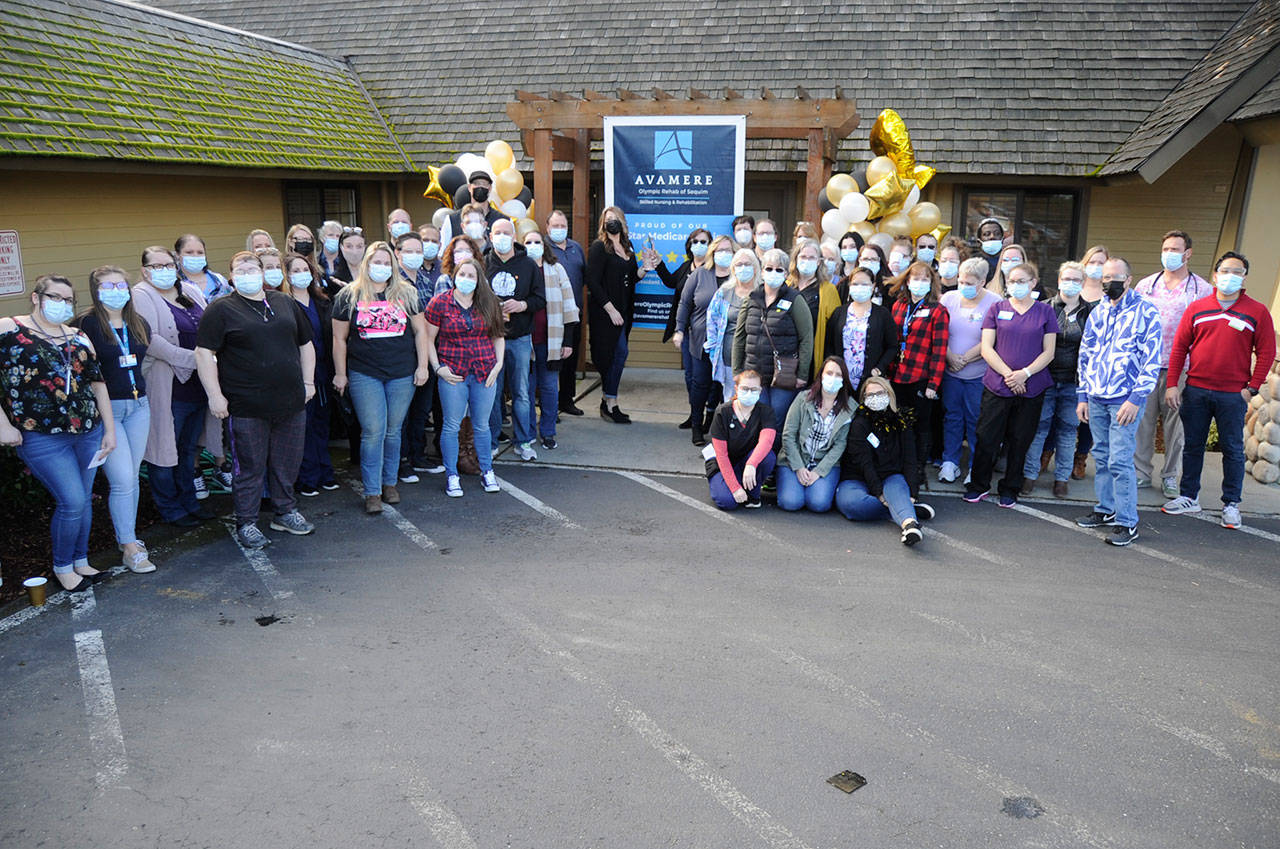 Staff at Avamere Olympic Rehabilitation of Sequim gather for a photo on Feb. 26 to celebrate a recent Five-Star Quality rating from Medicare and Medicaid. Sequim Gazette photo by Matthew Nash