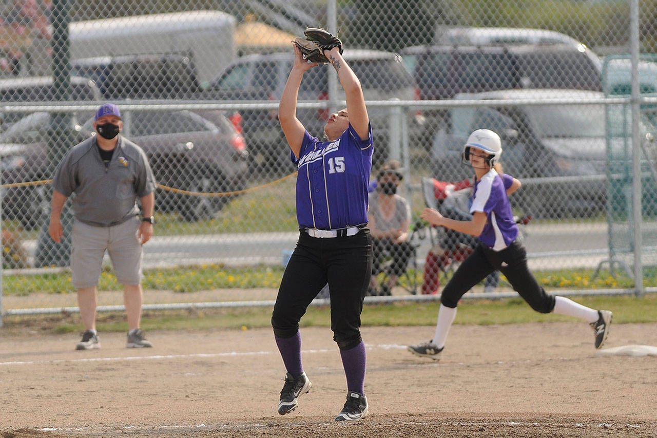 Sequim’s Addie Smith fouls off a pitch as the Wolves take on North Kitsap on April 21. Sequim Gazette photo by Michael Dashiell
Sequim third baseman Kailyn Lopez snags a pop-up in the Wolves’ April 21 game against visiting North Kitsap. Sequim topped the Vikings 6-2.