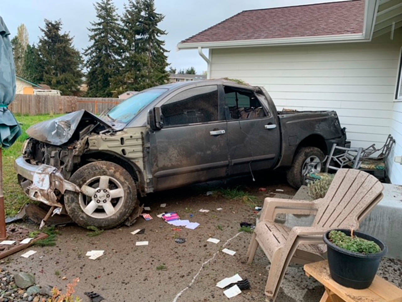 Clallam County deputies responded to a vehicle striking a home on the 1000 block of Woodcock Road in Sequim on April 30. Photo courtesy of Clallam County Sheriff’s Office