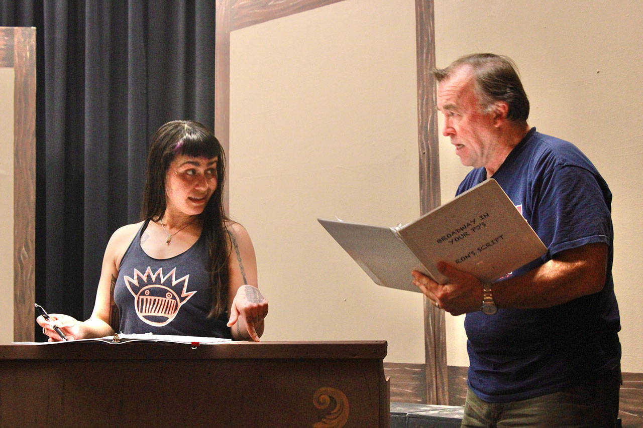 Olympic Theatre Arts newcomer Ashley Burton rehearses with veteran actor/director Ron Graham for Jim Guthrie’s “Searching for a Heart." Photo courtesy of Olympic Theatre Arts