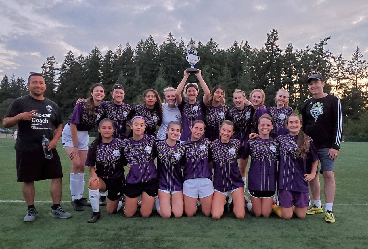 Sequim JSC G03, a team comprised of Sequim and Port Angeles high school-aged players, celebrate a win in the Bainbridge Island Shield on Aug. 15. The team, coached by Javier Gomez and Carl Weber, went 2-0-1 to lead their division. The Sequim-area boys U19 team — SJS Elite Lightning BU19 — also took top honors after going 2-0-1 and out-scoring opponents 8-1. Submitted photo