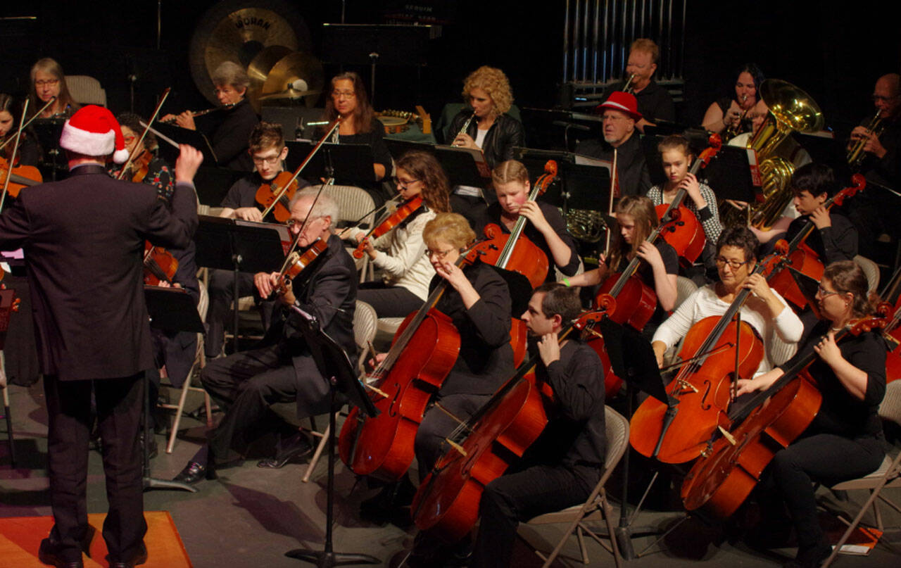 Members of the advanced youth Strings players perform with the Sequim Community Orchestra at Sequim High School in December 2018. Sequim Gazette photo by Emily Matthiessen