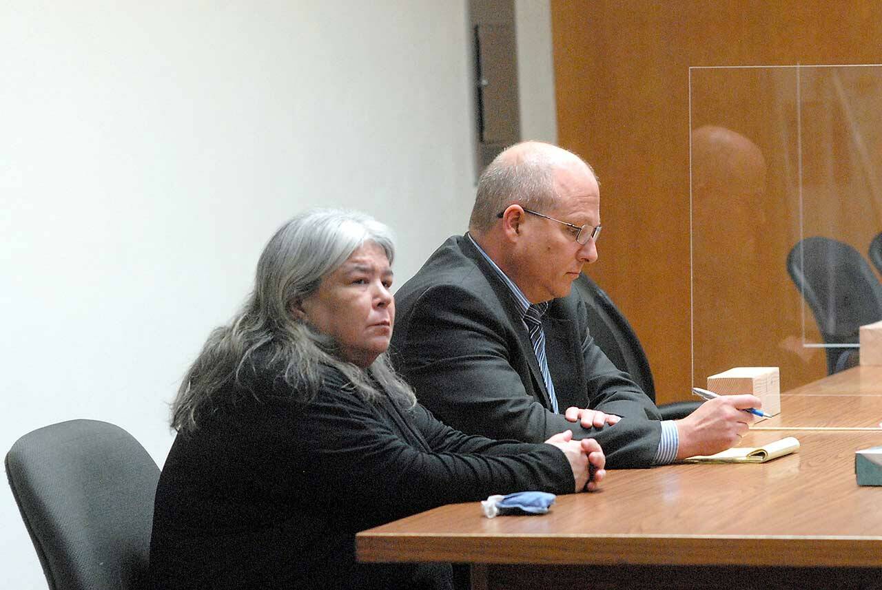 Larissa Jean Dietz of Sequim sits with attorney Stan Myers in July at Clallam County Superior Court in Port Angeles. File photo by Keith Thorpe/Olympic Peninsula News Group