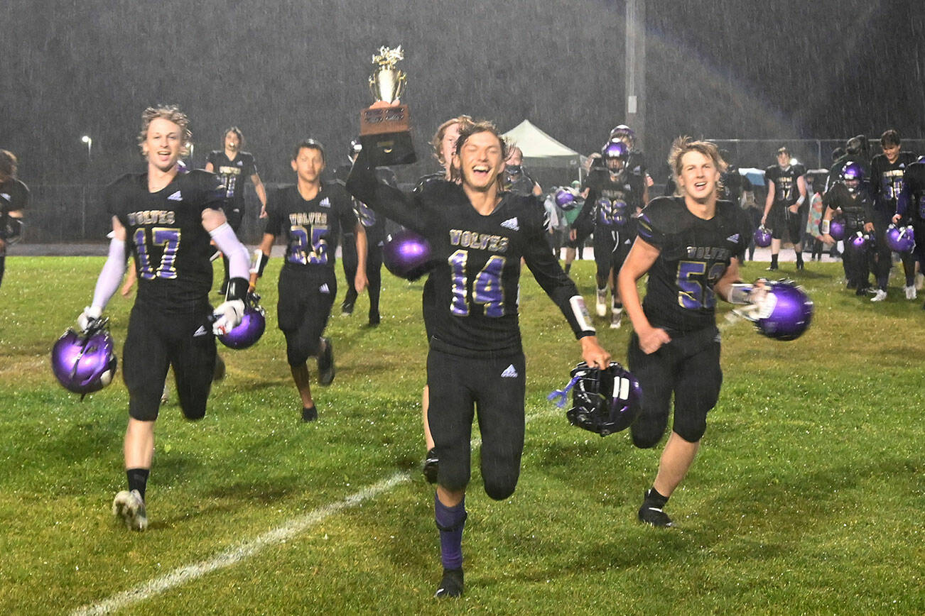 FOOTBALL: NFL following Sequim's lead with protective caps