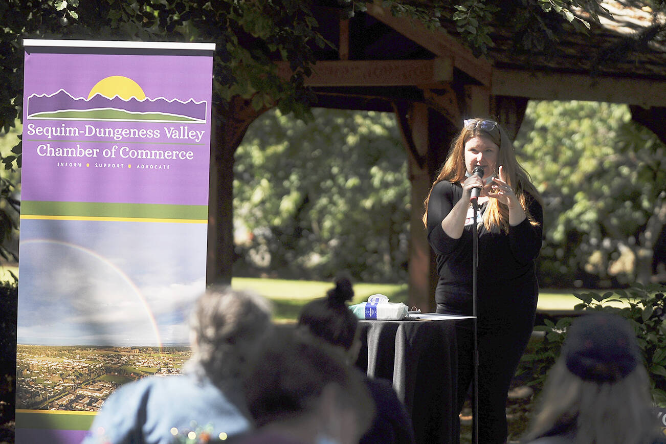 Anji Scalf, executive director of the Sequim-Dungeness Chamber of Commerce, speaks at a chamber luncheon honoring first responders and other recipients of the chamber’s annual Citizen of the Year award, held on Aug. 24. Scalf announced she is resigning her position effective Oct. 12. Sequim Gazette file photo by Michael Dashiell