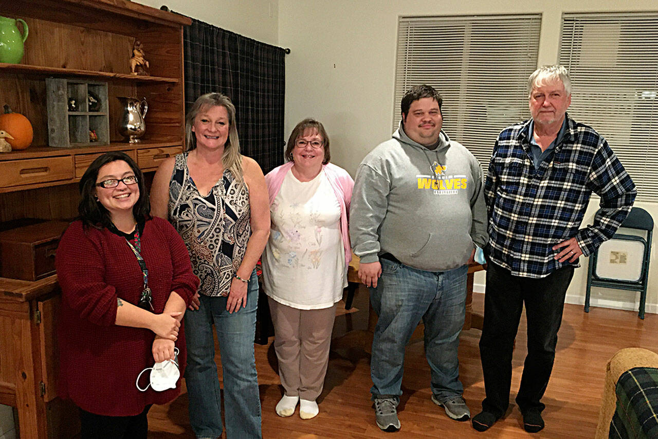 Sequim city council candidates — from left, Rachel Anderson, Vicki Lowe, Kathy Downer, Brandon Janisse and Lowell Rathbun — gather for a photo-op about an hour after 2021 General Election results were announced on Nov. 2. The quintet out-paced their opponents to hold leads in the election. Sequim Gazette photo by Matthew Nash