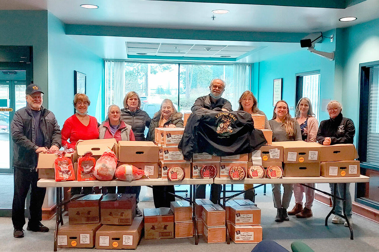 Pictured, from left, are Sequim Elks members Mike Subert, Maura Mattson, Suzan Cantrell, Katherine Evans, Sandra Stafford and Mel Fisher, with Child Advocate Program representatives Jennifer Petty, Tracie Pyeatt, Alicia Scofield and Valerie Brooks, the Child Advocate Program coordinator. Submitted photo