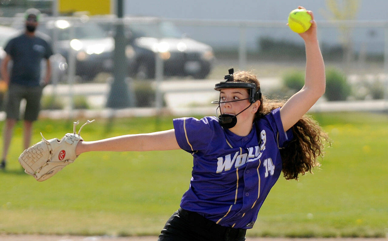 Sequim’s Lainy Vig pitches against North Kitsap in a league match-up in April 2021.