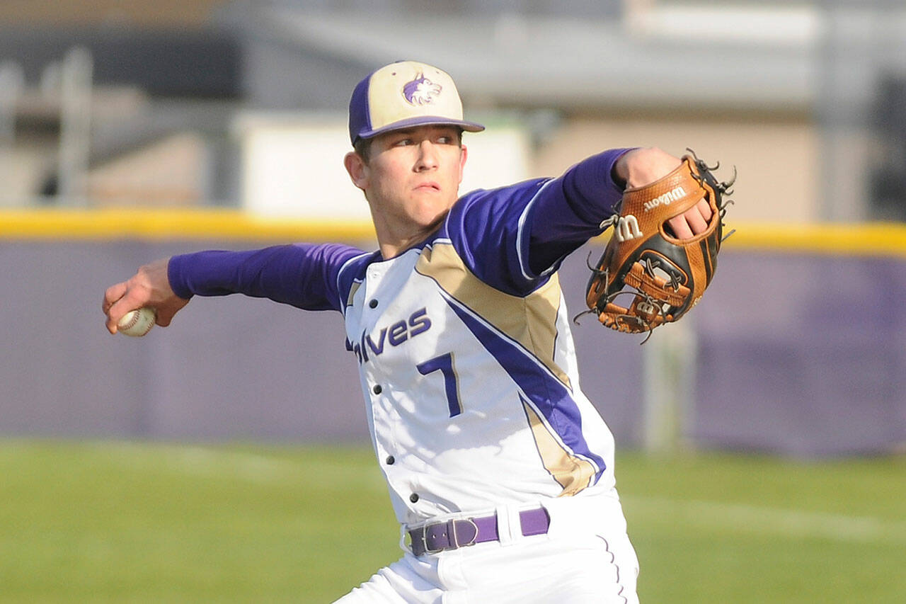 Sequim started Conor Bear pitches in the first inning of a 10-0 loss to Kingston on March 30. Bear struck out seven Buccaneers in four innings. Sequim Gazette photo by Michael Dashiell