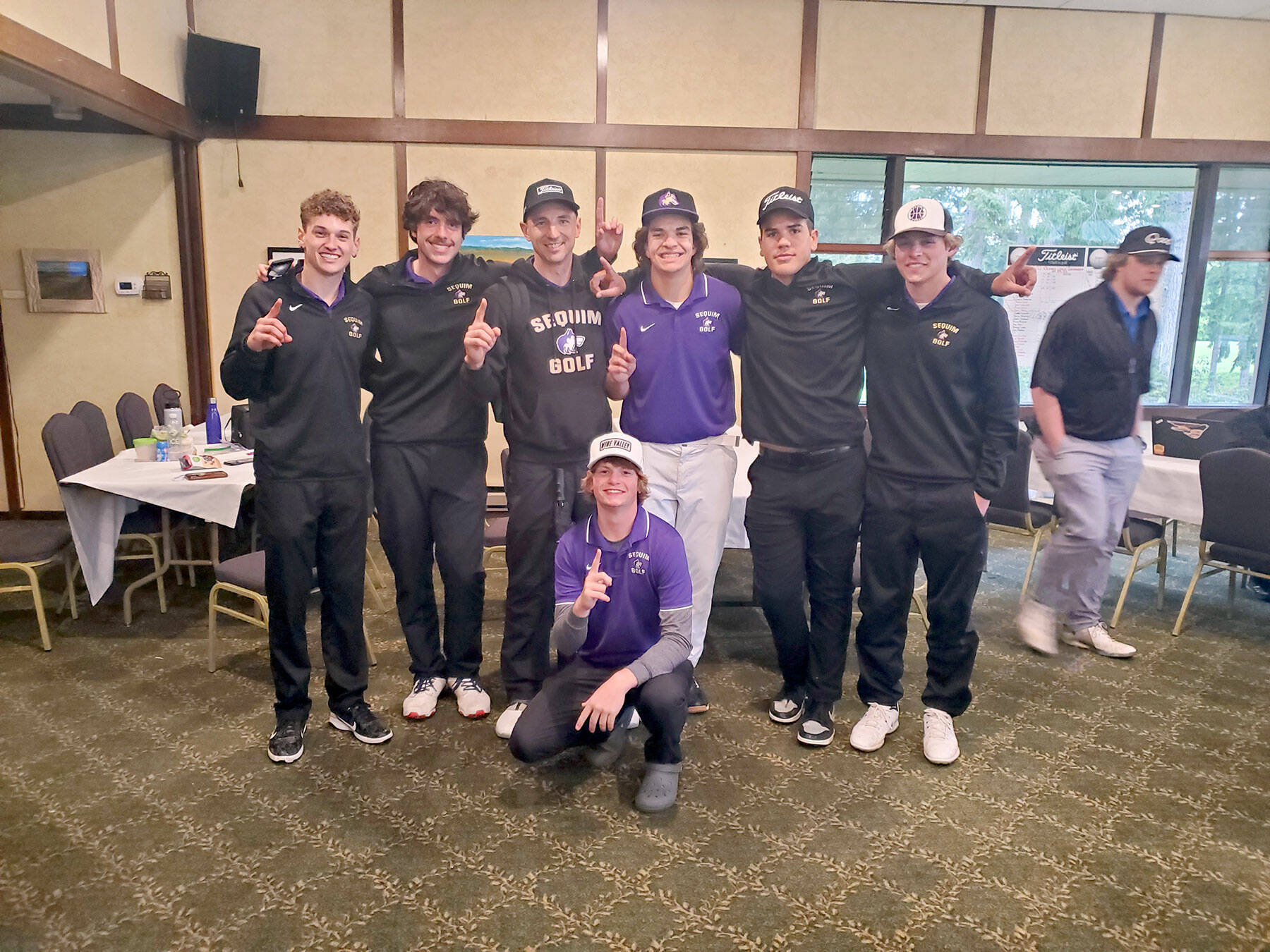 Submitted photo 
The Sequim boys golf team celebrate a 19-stroke victory in the Olympic League Boys Golf Championships held May 9 at Kitsap Golf & Country Club. Sequim’s Ben Sweet (kneeling) won the individual league title by one stroke over teammate Dominic Riccobene, far left. The Wolves also finished the Olympic League regular season with an undefeated record. Team members are, from left, Riccobene, Cole Smithson, head coach Sean O’Mera, Lars Wiker, Pryce Glasser, Zackary Thompson and Sweet.