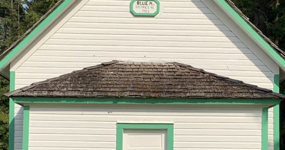 Submitted photo
Andy Benitez (back row, center) and fellow Scouts BSA members and friends complete a repainting of the Blue Mountain School earlier this year. Pictured with Benitez are (back row, from left) Beau Halverson, Hunter Halverson (front) and Kayden Disinski (right).