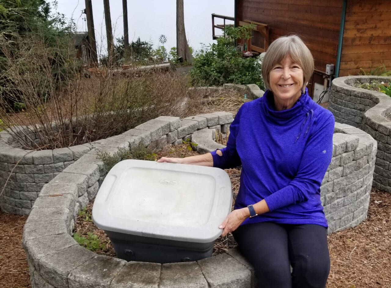 Photo courtesy of Judy Mann / Master Gardener Judy Mann, pictured here with her worm bin, has been enjoying the vermicompost her worms have produced for more than 10 years.