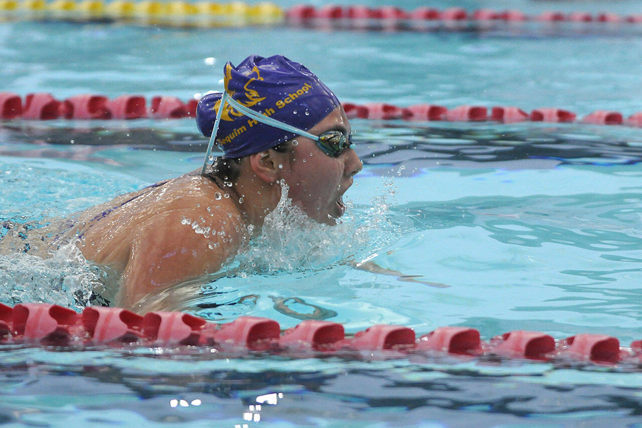 Sequim Gazette file photoS by Michael Dashiell
Sequim’s Melia Nelson competes in the breaststroke portion of the 200 individual medley as the Wolves take on Kingston and North Kitsap in September 2021.