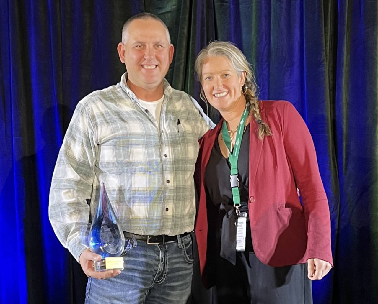 Submitted photo
Sean Coleman, Washington Festivals & Events Association’s 2022 Washington State Volunteer of the year, celebrates the honor with Victoria Jones, executive director of Port Angeles Marathon Association, recipient of Best of Show for the Run the Peninsula series, at WFEA’s annual awards dinner on Nov. 2 in Bellevue.