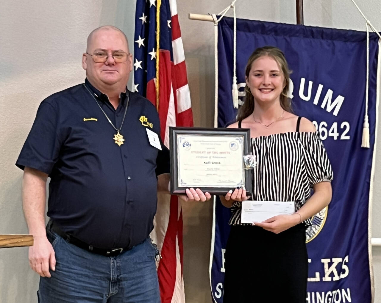 Submitted photo / Sequim High School sophomore Kalli Grove accepts her Student of the Month Award from Lodge Secretary Jim Headley.