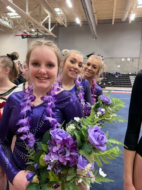 Submitted photo / Sequim High gymnasts (from left) Lucy Spelker, Susannah Sharp and Kori Miller finish their 2022-2023 season at the 1A/2A/3A state finals in Sammamish last week.