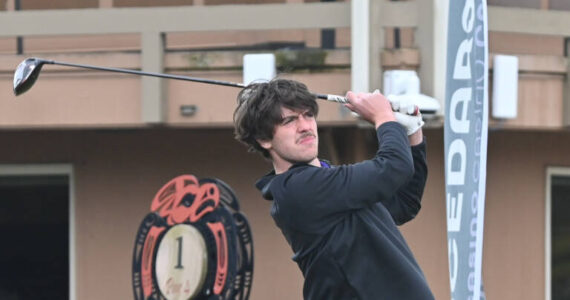 Sequim Gazette file photo by Michael Dashiell / Sequim’s Cole Smithson tees off on the first hole in a match against Bainbridge in April 2022.