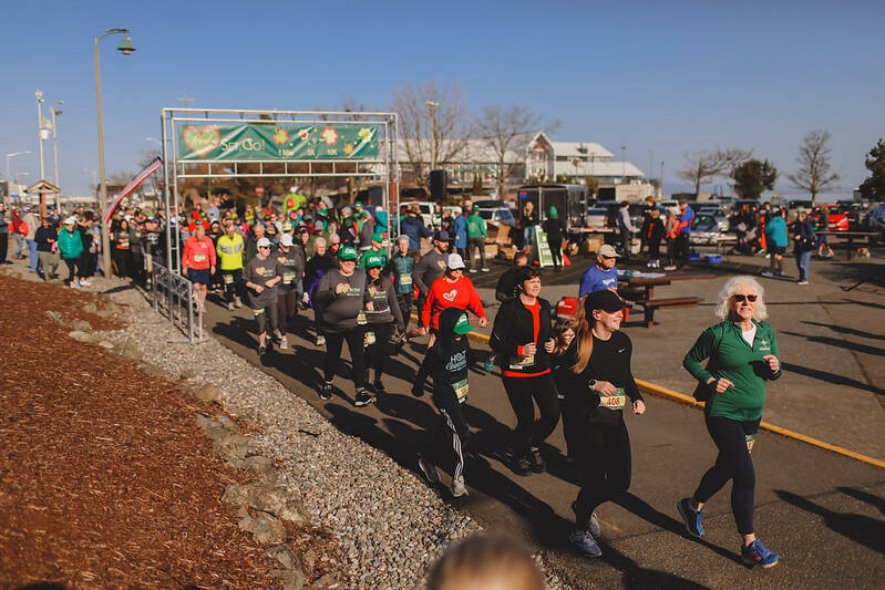 Photo by Lexie Winters / Participants break from the start of the St. Patrick’s Day Race in Port Angeles on March 18.