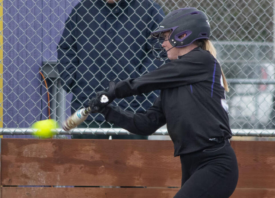 Sequim Gazette photo by Emily Matthiessen / Sequim’s Lexi King bats in the Wolves’ 26-11 rout of Bremerton on March 23.