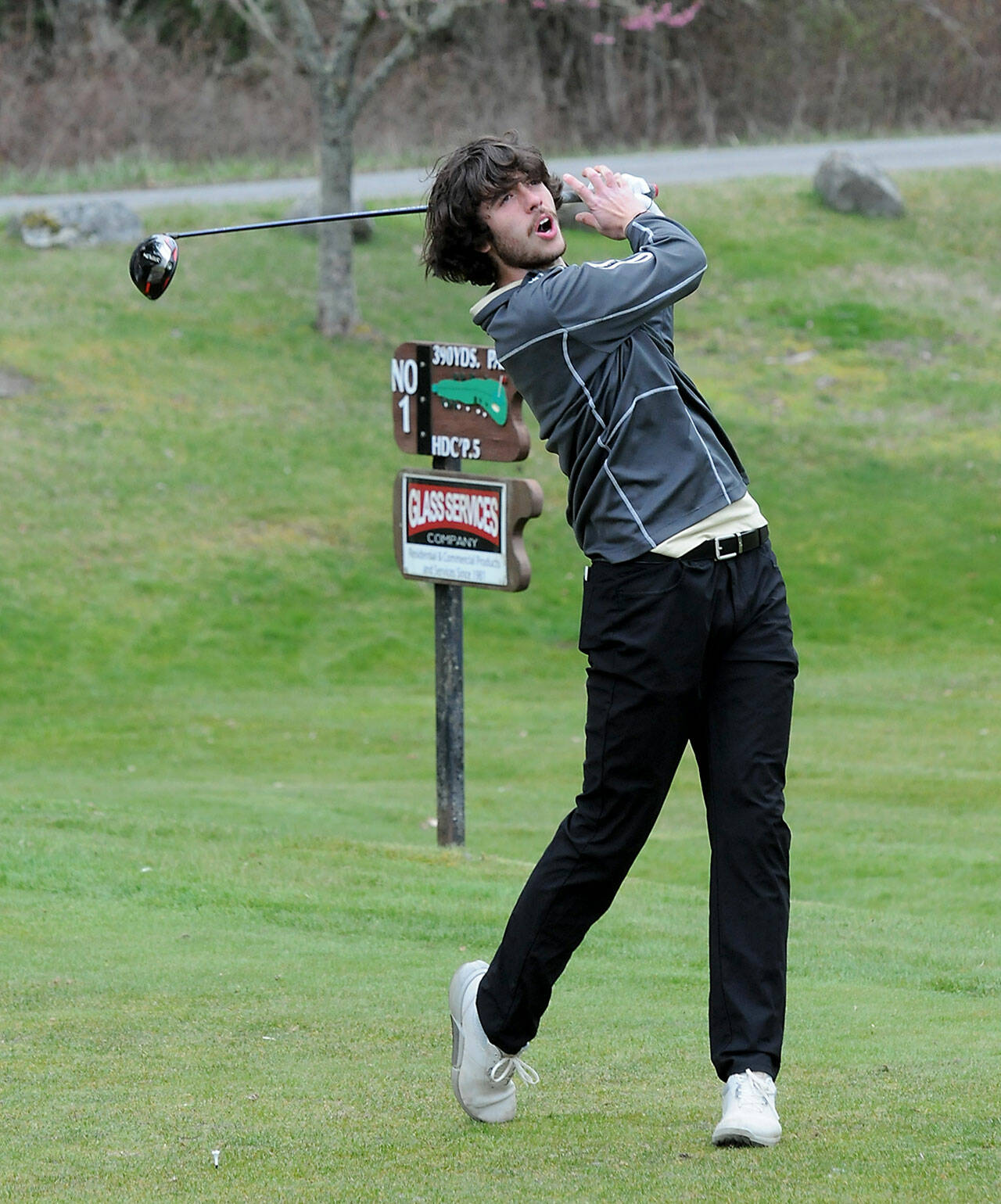 Photo by Keith Thorpe/Olympic Peninsula News Group / Cole Smithson of Sequim takes his tee shot on the first hole on March 30 at Peninsula Golf Course in Port Angeles.