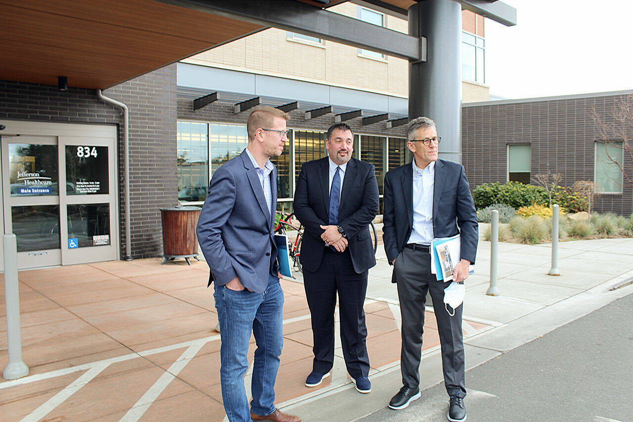 Photo by Tina Herschelman / U.S. Rep. Derek Kilmer, D-Gig Harbor, left, visits Jefferson Healthcare in Port Townsend on March 31, meeting with COO Jacob Davidson, center, and CEO Mike Glenn.