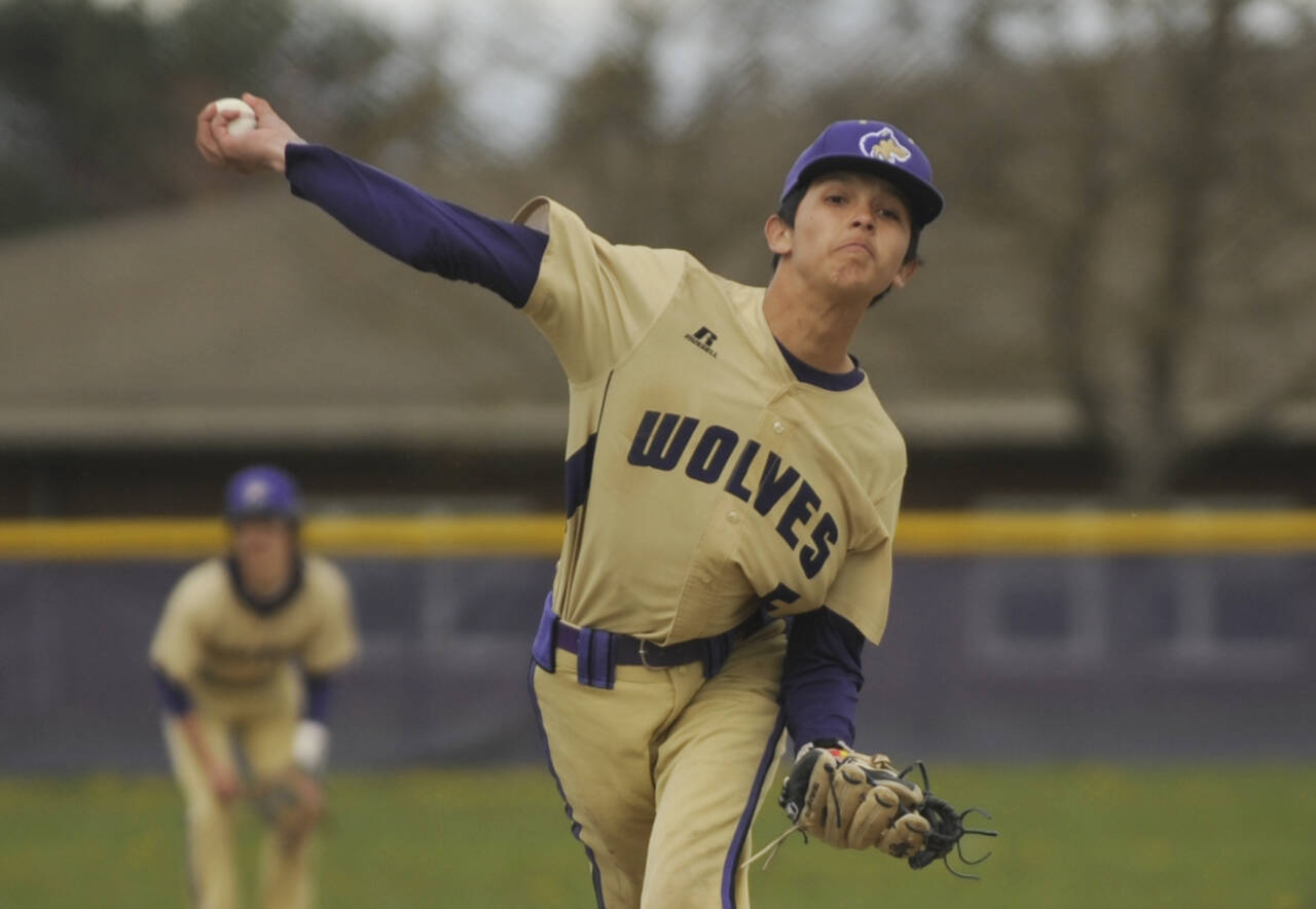 Sequim Gazette photo by Michael Dashiell / Sequim pitcher Toppy Robideau pitches in the first inning of a Wolves’ 4-1 home win over Bremerton on April 18.