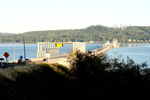 File photo by Brian McLean/Olympic Peninsula News Group / Traffic crosses the Hood Canal Bridge along state Highway 104 in April. State Department of Transportation crews begin permanent repairs to the bridge on Saturday.