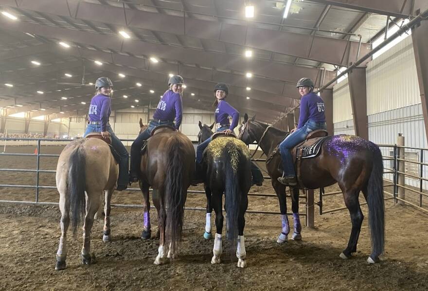 Sequim Equestrian Team members (from left) Kennady Gilbertson, Paige Reed, Sydney Hutton and Libby Swanberg place fifth in Team Canadian Flags at the Washington High School Equestrian Team state finals in Moses Lake.