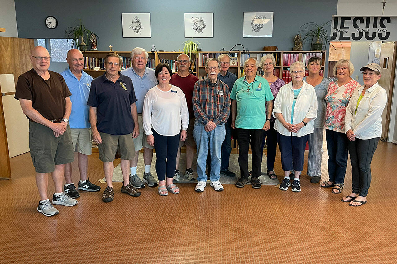 Sequim Gazette photo by Matthew Nash
A majority of the volunteers with the Society of St. Vincent de Paul at the St. Joseph Conference in Sequim gather before their first June meeting on June 12. Organizers say they’ve seen a jump in emergency need for rent, utilities, and other necessities.