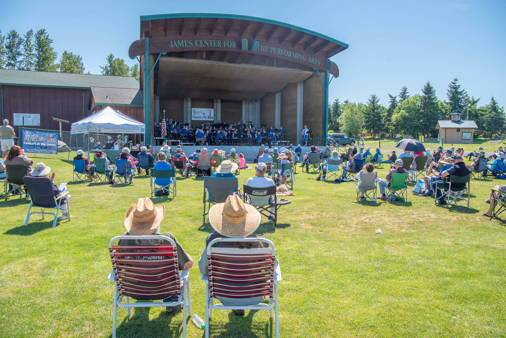 Sequim Gazette photo by Emily Matthiessen / Music fans enjoy a sunny spring day and a free concert as the Sequim City Band entertains with “Building a Legacy.” The event at The James Center for Performing Arts included a ribbon-cutting and tours of the band’s expanded rehearsal space.