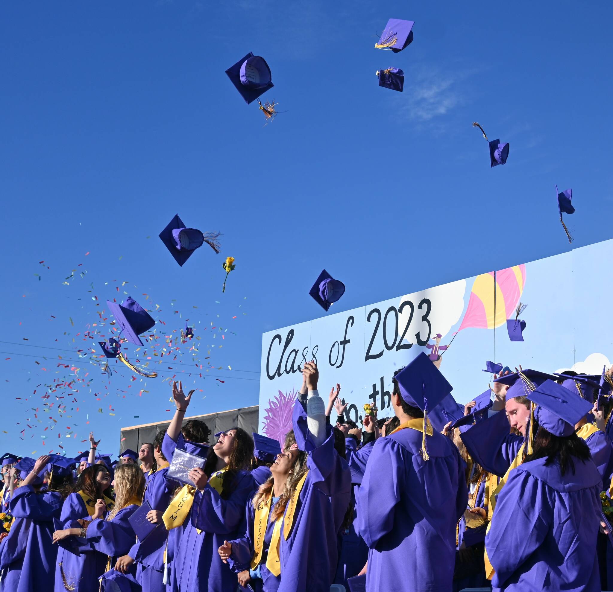 Sequim Gazette photo by Michael Dashiell / Members of Sequim High School’s Class of 2023 toss their graduation caps to the skies at the conclusion of SHS’s commencement ceremony on June 16; about 166 seniors earned their diplomas that night.