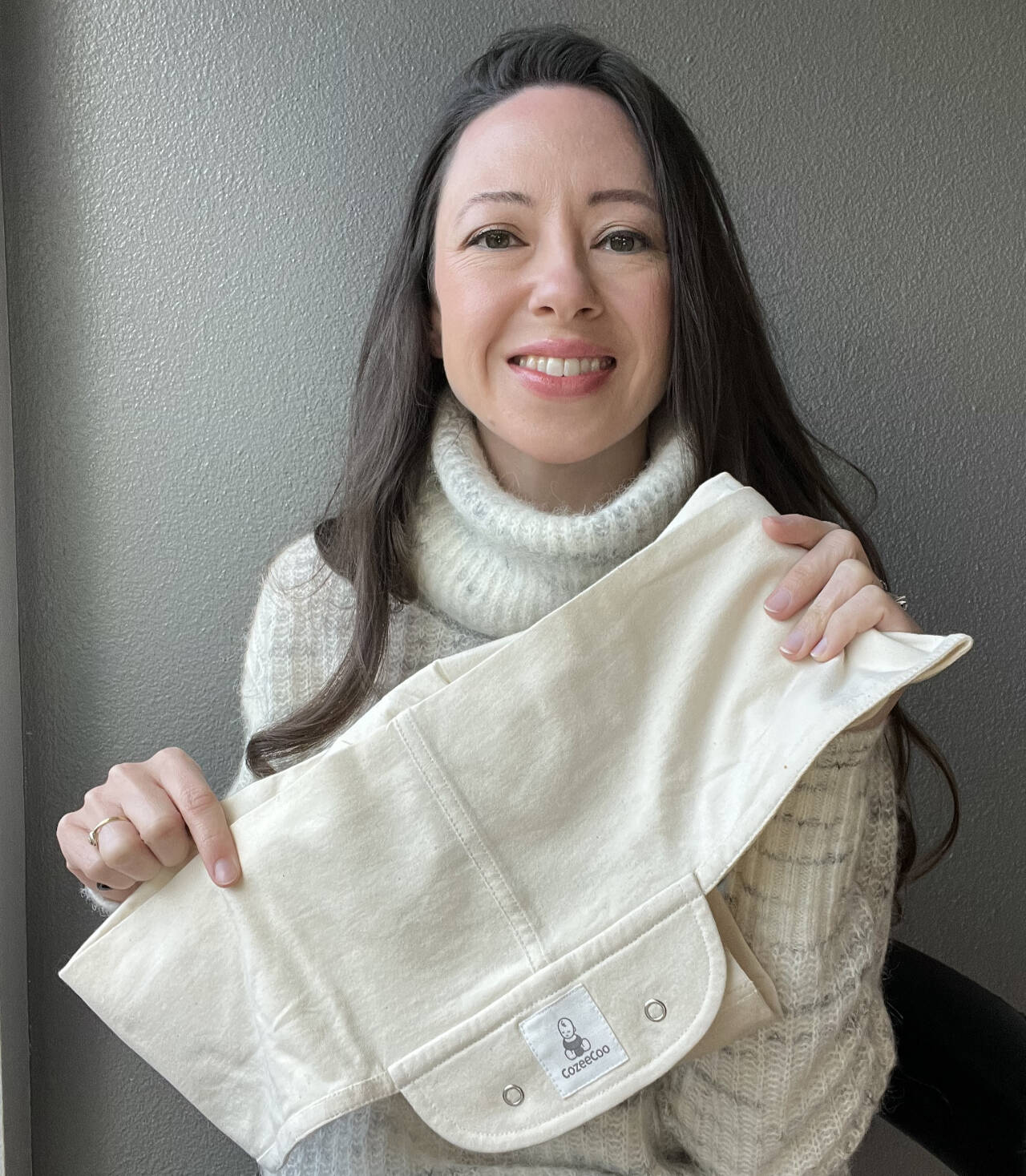 Photos courtesy of Jennifer Stelmakh
Former Sequim resident Jennifer Stelmakh has developed the CozeeCoo, a wearable blanket that helps babies dealing with medical issues.