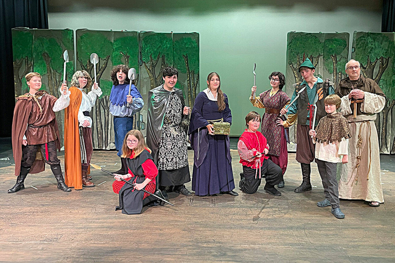 Sequim Gazette photo by Matthew Nash
Robin Hood and some of his band of merry men surround the Sheriff of Nottingham, his guards and Lady Marion in Sherwood Forest during a scene in Olympic Theatre Arts The Somewhat True Tale of Robin Hood.