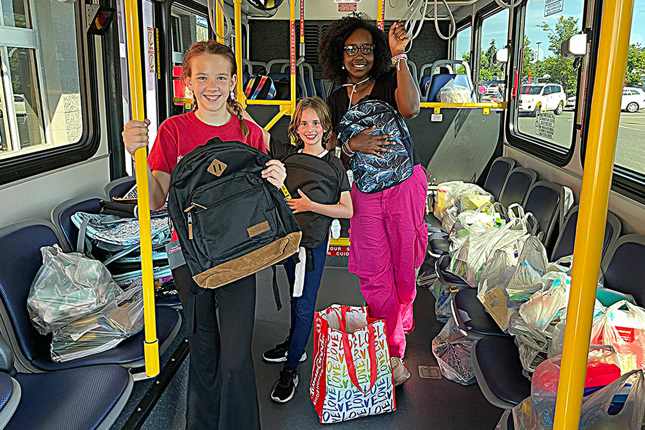 Shoppers help 'Stuff the Bus' for Back to School Fair | Sequim Gazette