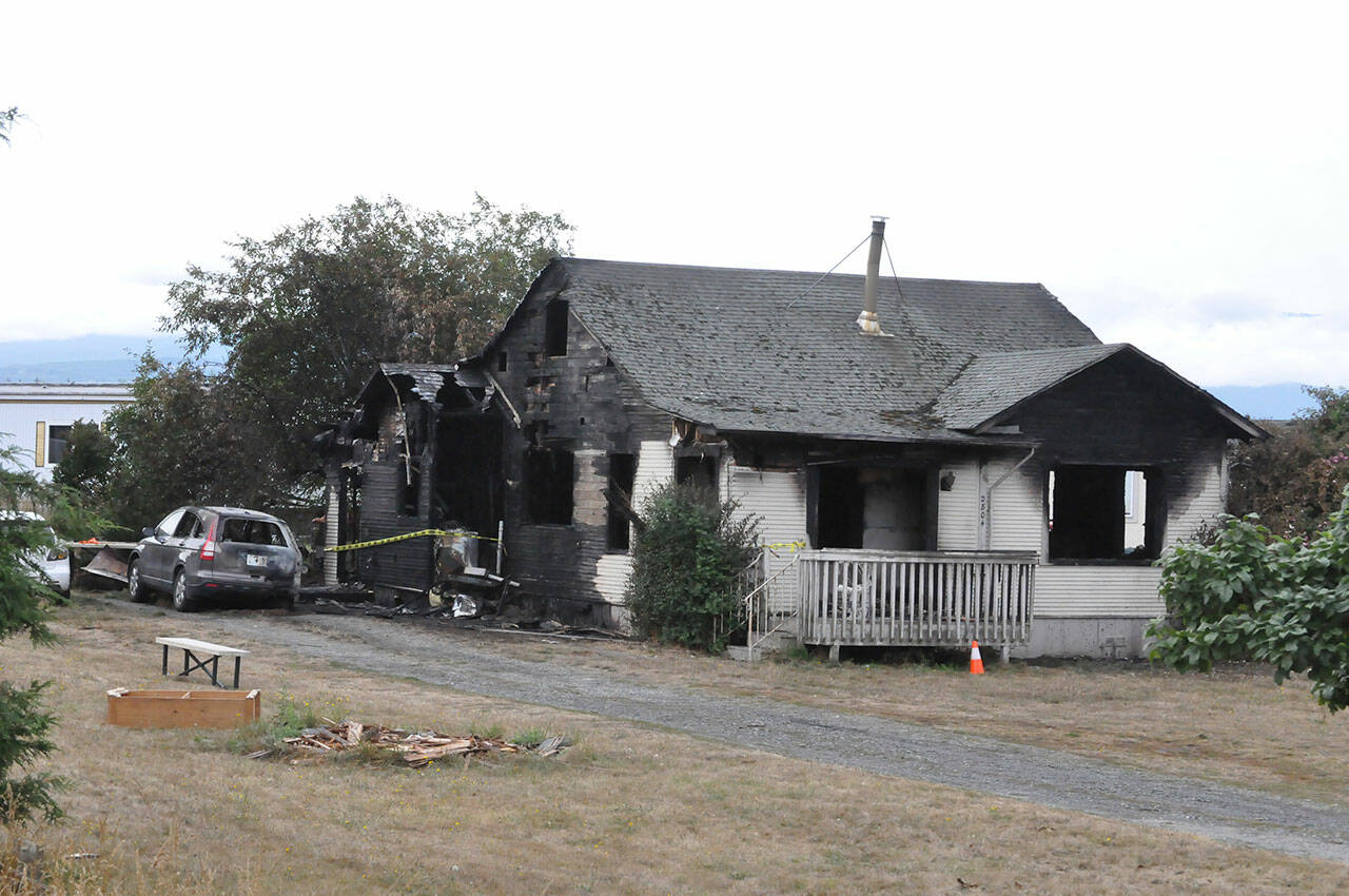 Sequim Gazette photo by Matthew Nash
A family of three escaped a fire in their Dungeness home just after midnight on Wednesday, Aug. 23.