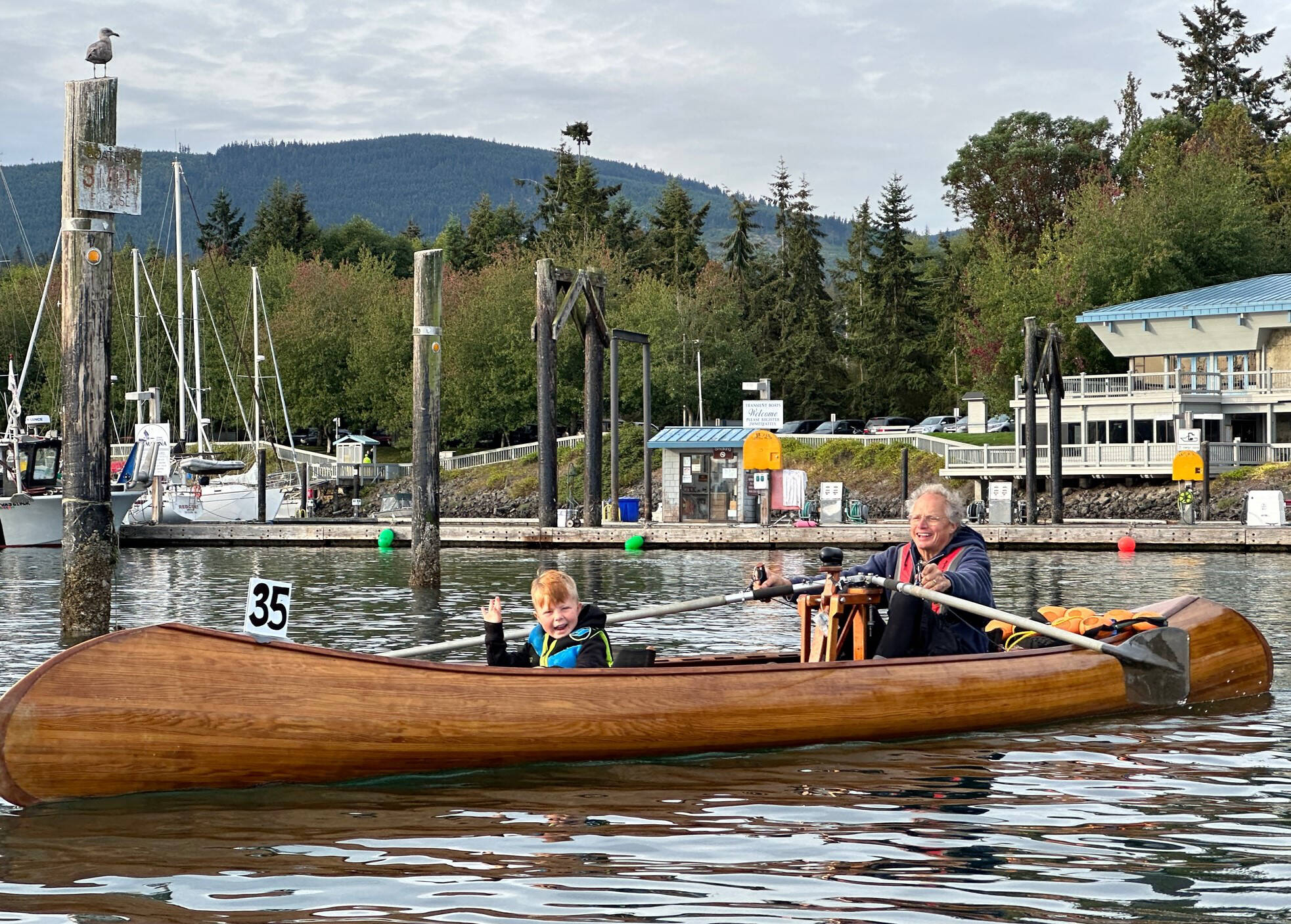 Photo by Mary and Kip Tulin
Robbie Niclas and grandson William, 5, both of Sequim, use a canoe Niclas built in the 5-kilometer course for rowers and paddlers as part of Reach and Row for Hospice in 2022.