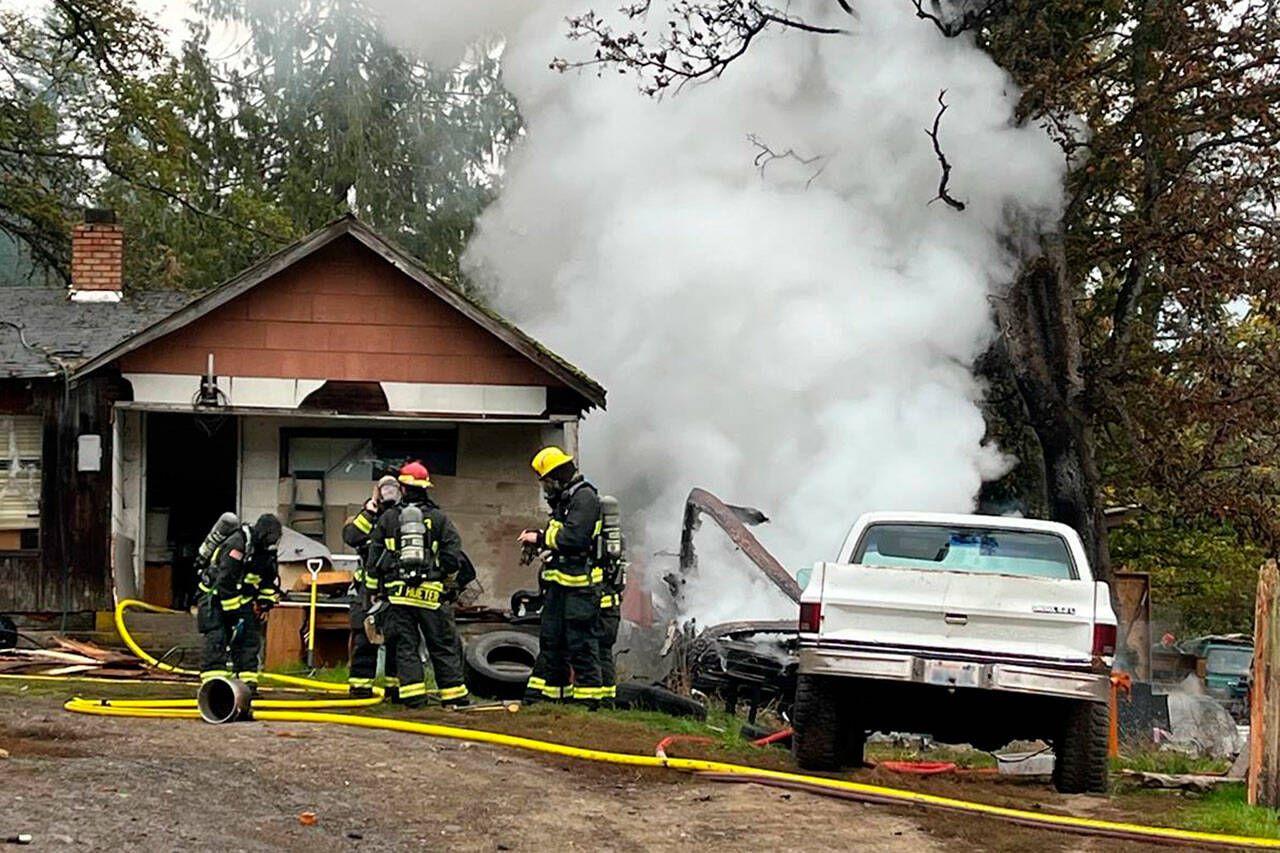 Photo by Chris Turner, Clallam County Fire District 3/ Firefighters extinguished a recreational vehicle fire early on Oct. 23 in the Sequim area.