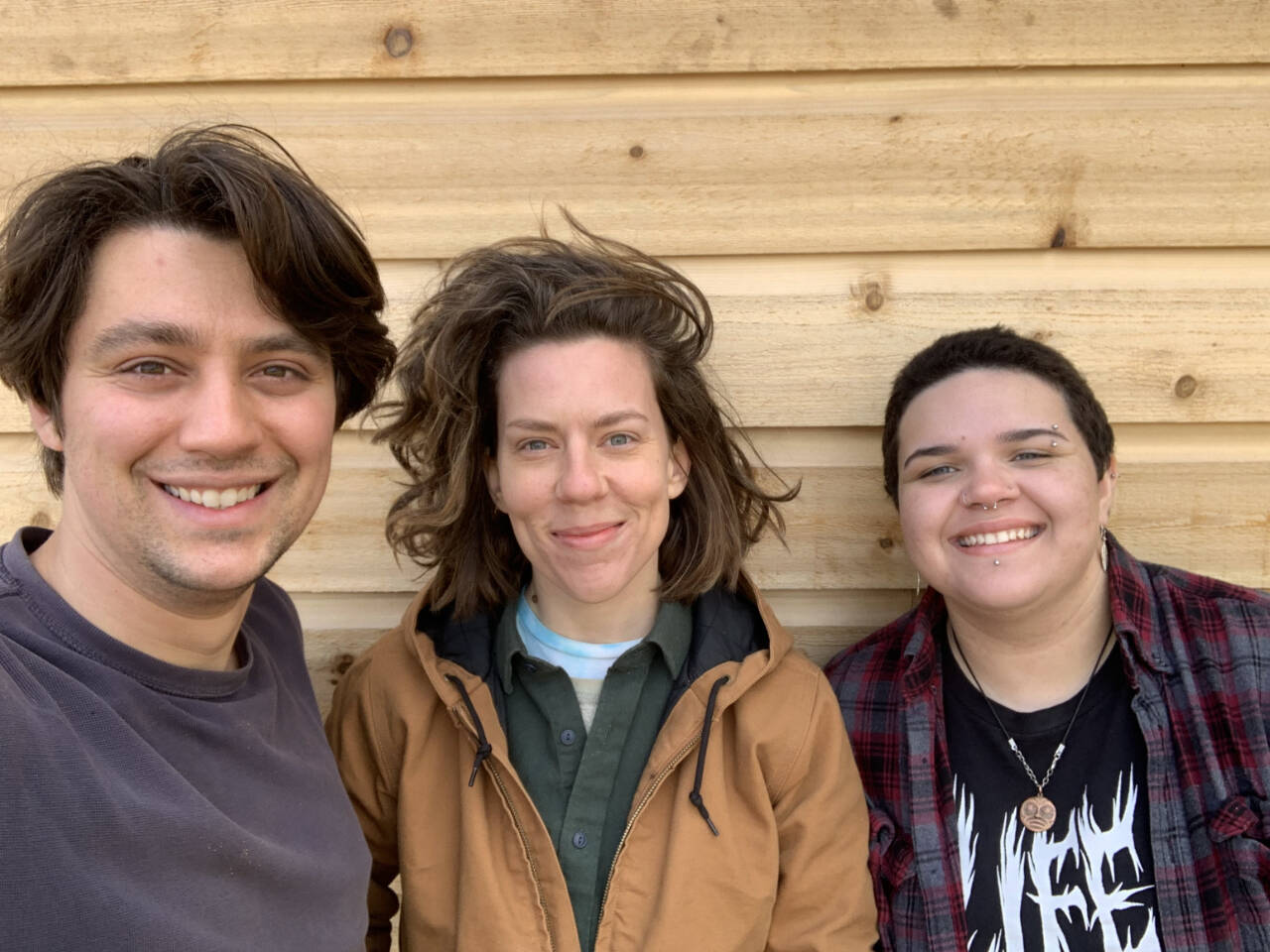 Photo courtesy of SisterLand Farms / Staff at SisterLand Farms, the North Olympic Land Trust’s 25th annual Farmer of the Year, include (from left) Benji, Jenson and Eli.