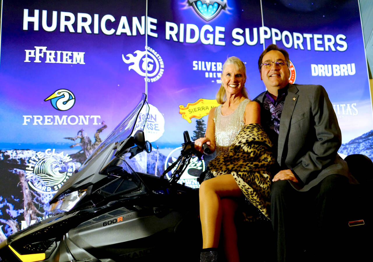 Photo by Greg Birch
Captain Crystal Stout and Greg Bondy pose on a snowmobile at the 2023 Winterfest event on Nov. 18. The vehicle was purchased through funds raised at Winterfest 2022.