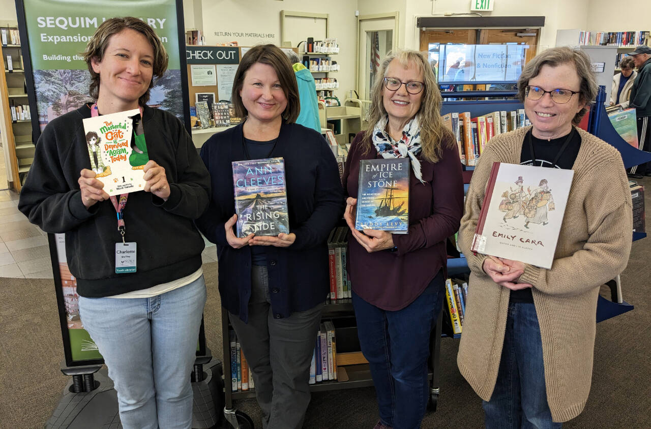 Photo courtesy of North Olympic Library System
Sequim Library staffers share their favorite reads from 2023. Pictured, from left, are Charlotte McGrew, Corrina Desmarais, Alisa Weiss and Ellen Schvetz.